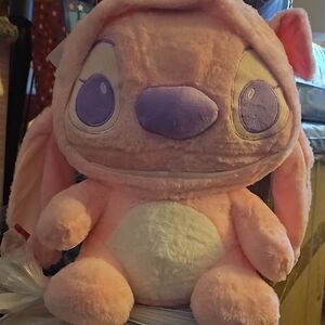 Pink Plush Toy with Purple Accents